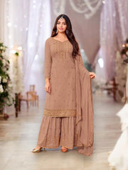 Traditional designer Salwar Kameez by Saree Ghor Charlotte, showcasing intricate ethnic embroidery and vibrant fabric for women.