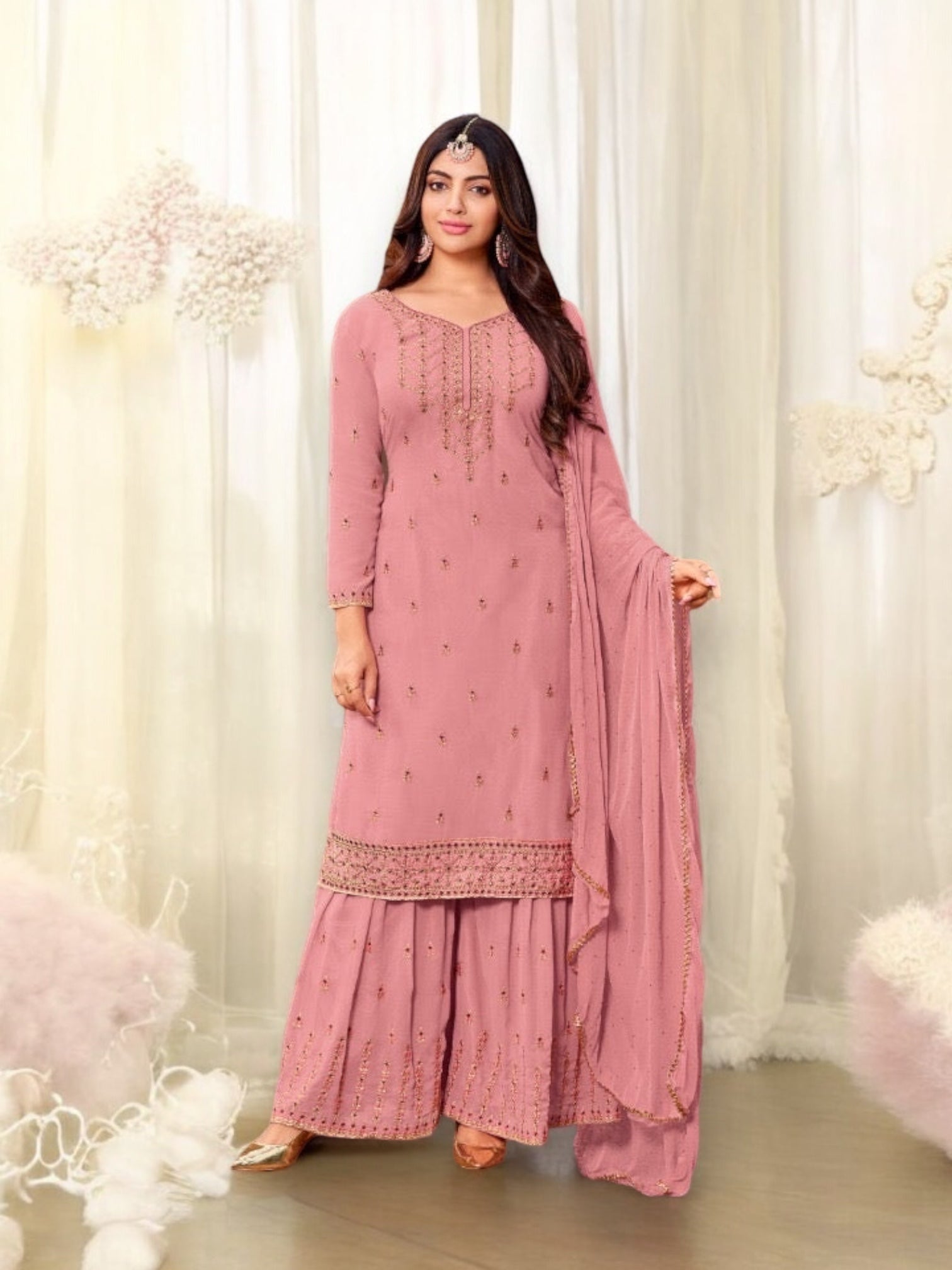 Traditional designer Salwar Kameez by Saree Ghor Charlotte, elegant ethnic wear for women, featuring intricate patterns and vibrant colors.