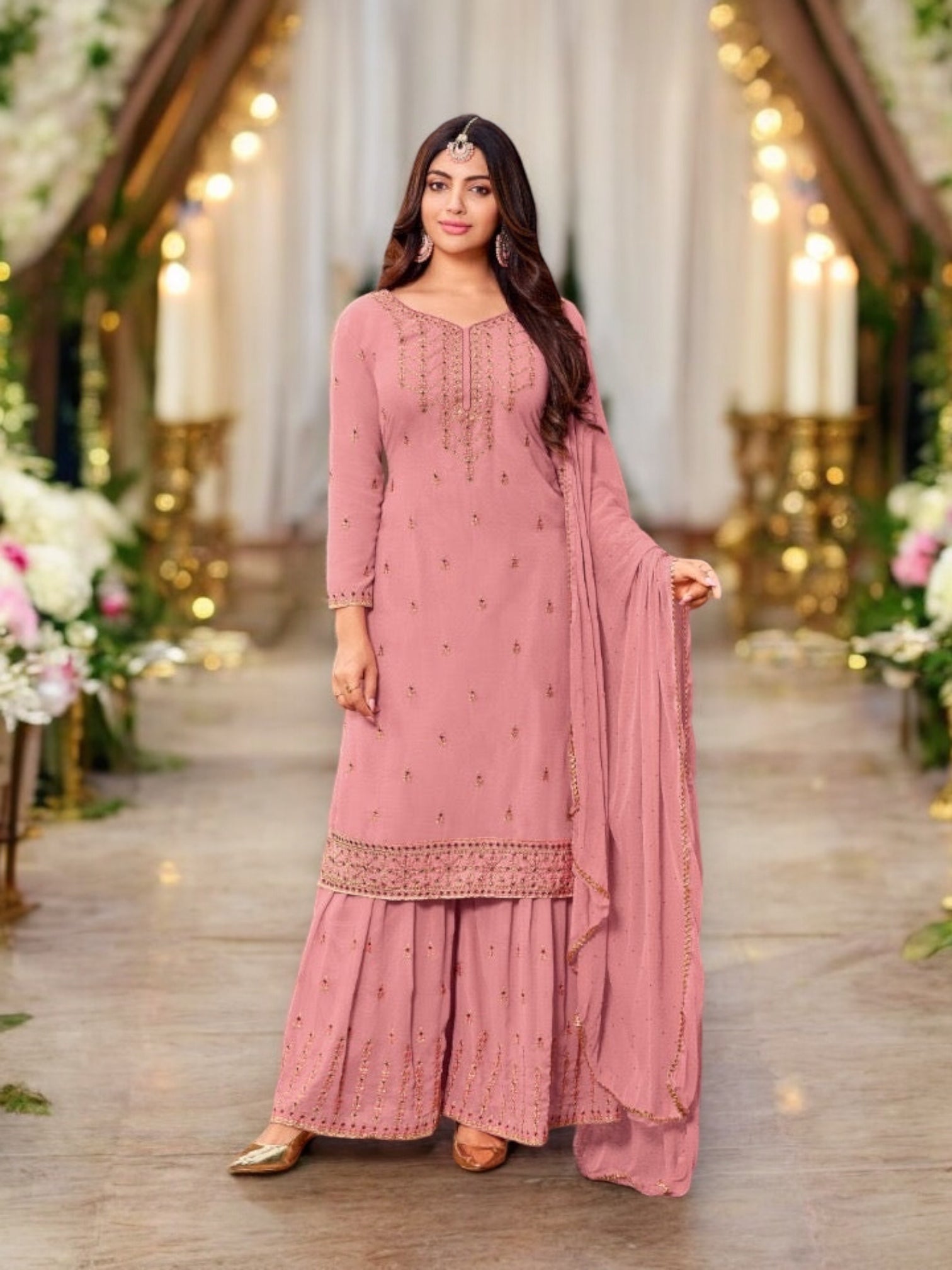 Traditional designer Salwar Kameez by Saree Ghor Charlotte, featuring intricate embroidery and vibrant ethnic wear for women.