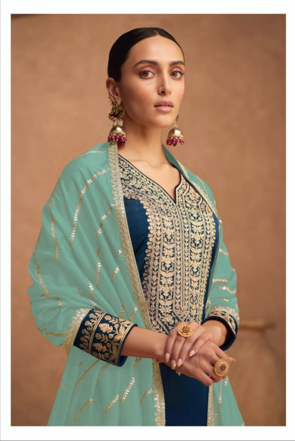 Traditional designer silk Salwar Kameez by Saree Ghor Charlotte, elegant ethnic wear for women featuring intricate craftsmanship.