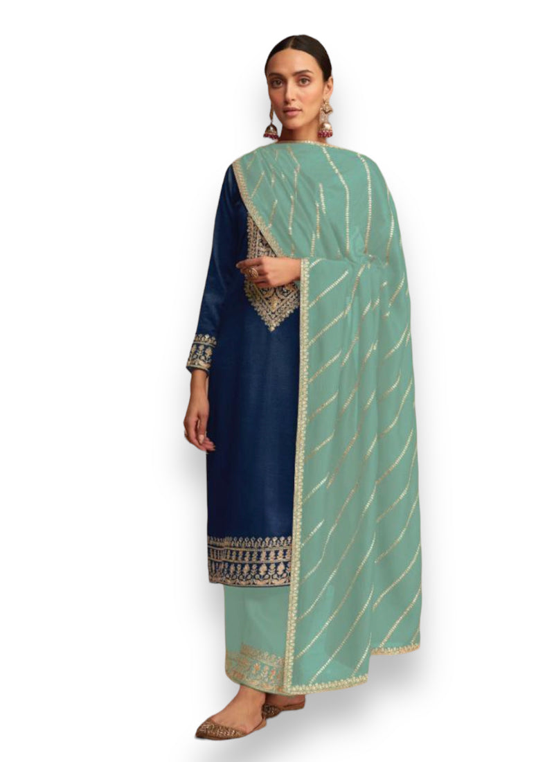 Elegant traditional silk salwar kameez by Saree Ghor Charlotte, showcasing intricate design and rich fabric for ethnic wear women.