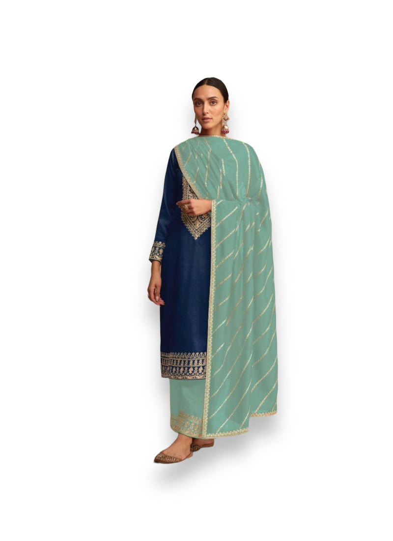 Traditional designer silk salwar kameez by Saree Ghor Charlotte, elegant ethnic wear for women with intricate embroidery.