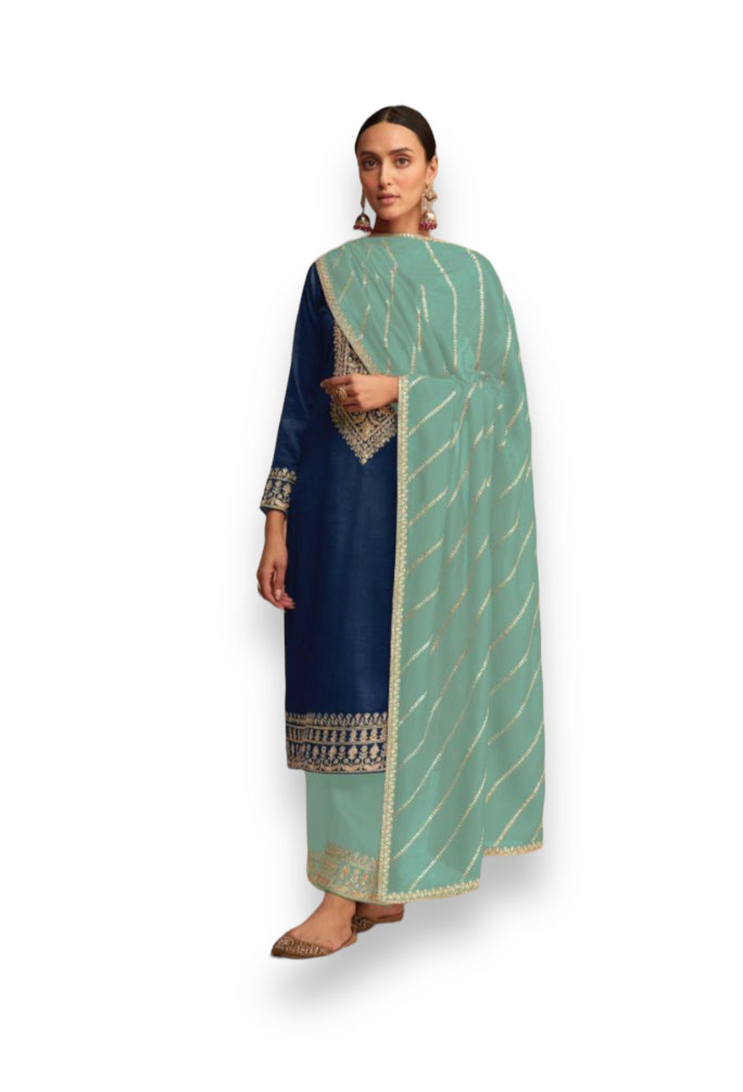 Traditional silk Salwar Kameez by Saree Ghor Charlotte, ethnic women’s cultural wear with intricate design and elegant silhouette.