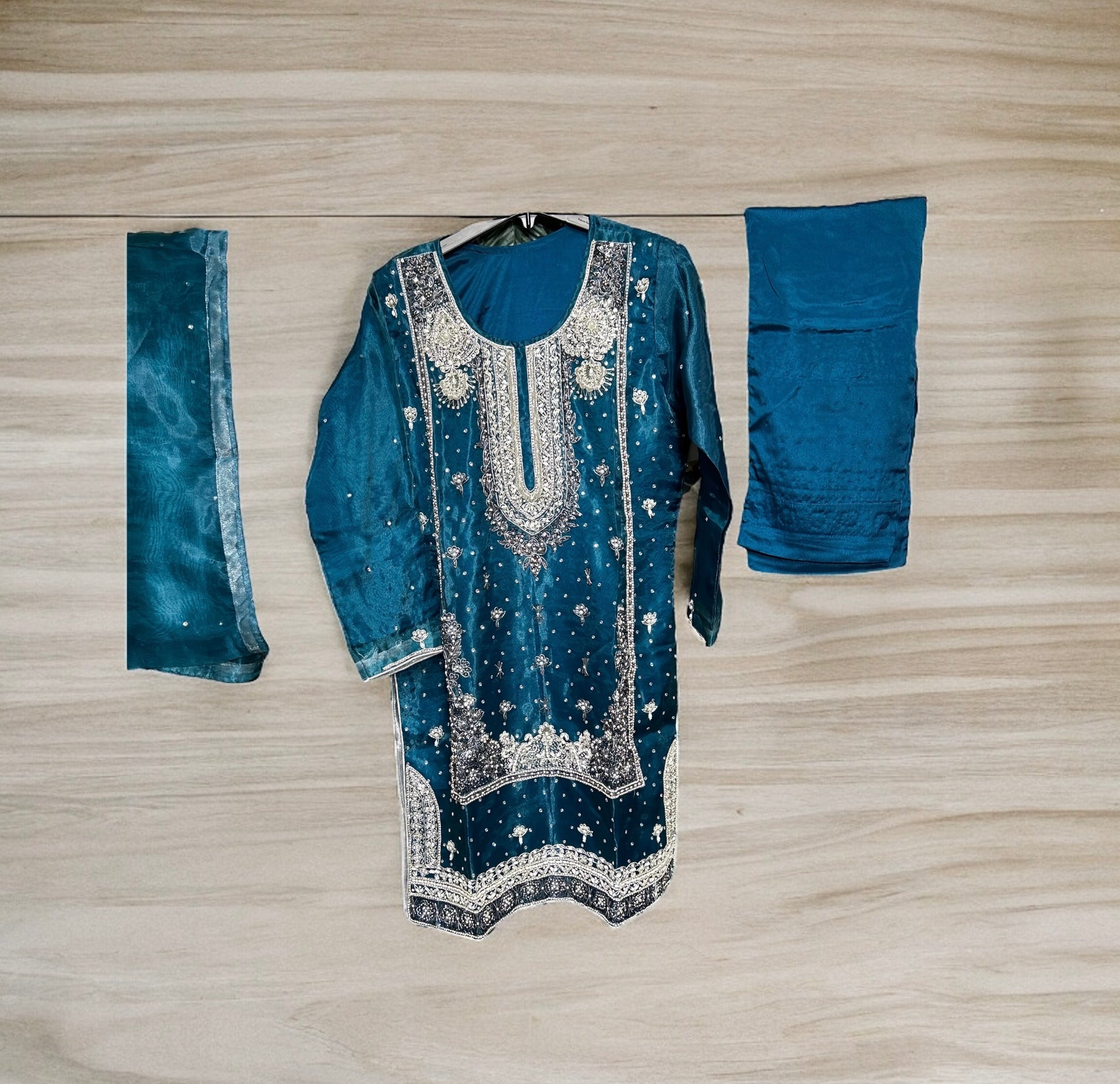 Traditional handwork designer Salwar Kameez ensemble by Saree Ghor Charlotte, showcasing intricate embroidery and elegant ethnic wear for women.