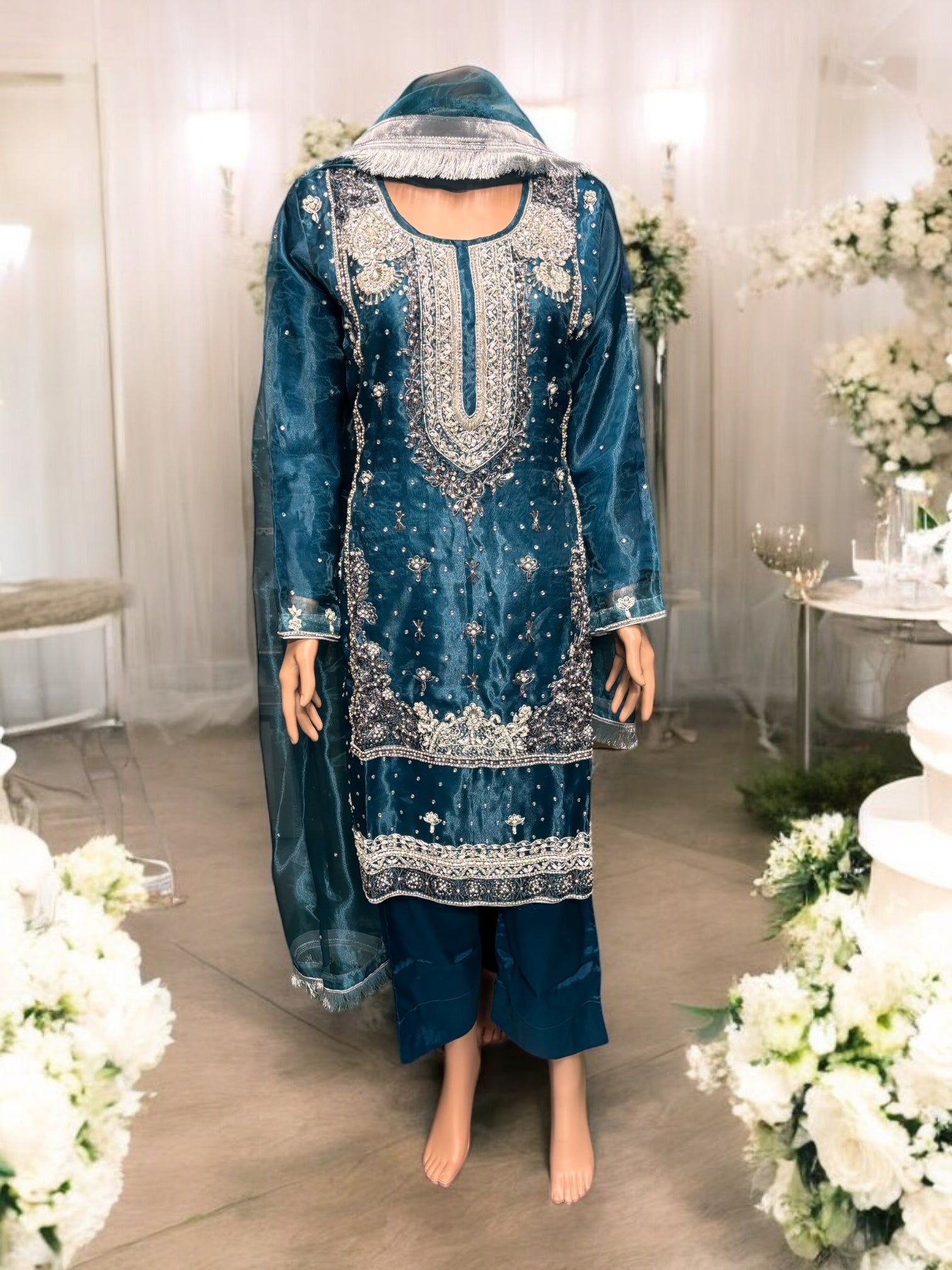 Traditional handwork designer Salwar Kameez ensemble by Saree Ghor Charlotte, featuring intricate embroidery and ethnic style for women.