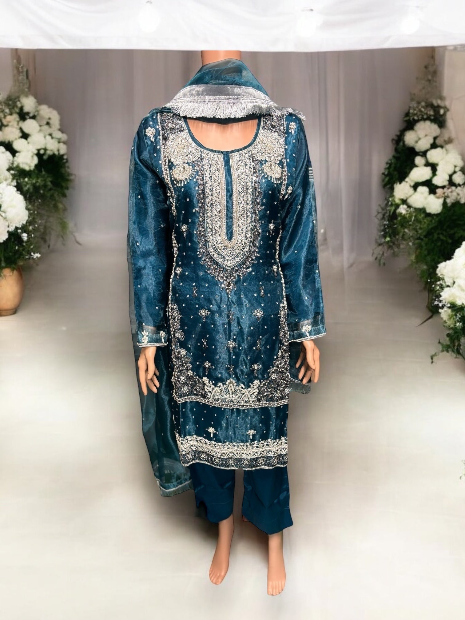 Traditional handwork designer salwar kameez ensemble by Saree Ghor Charlotte, featuring intricate embroidery and vibrant ethnic fabric.