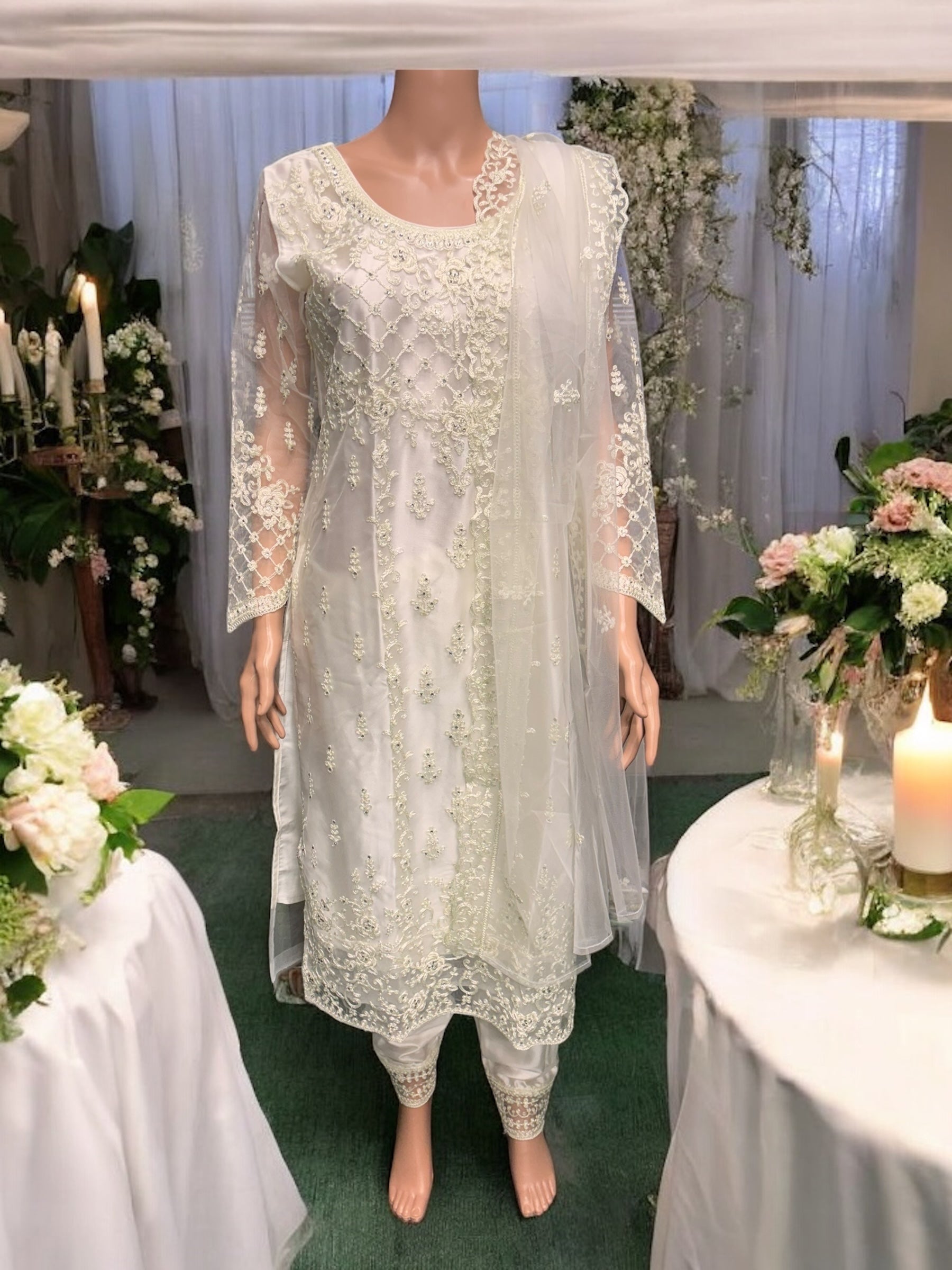 Traditional off-white designer Salwar Kameez by Saree Ghor Charlotte, elegant ethnic wear for women.