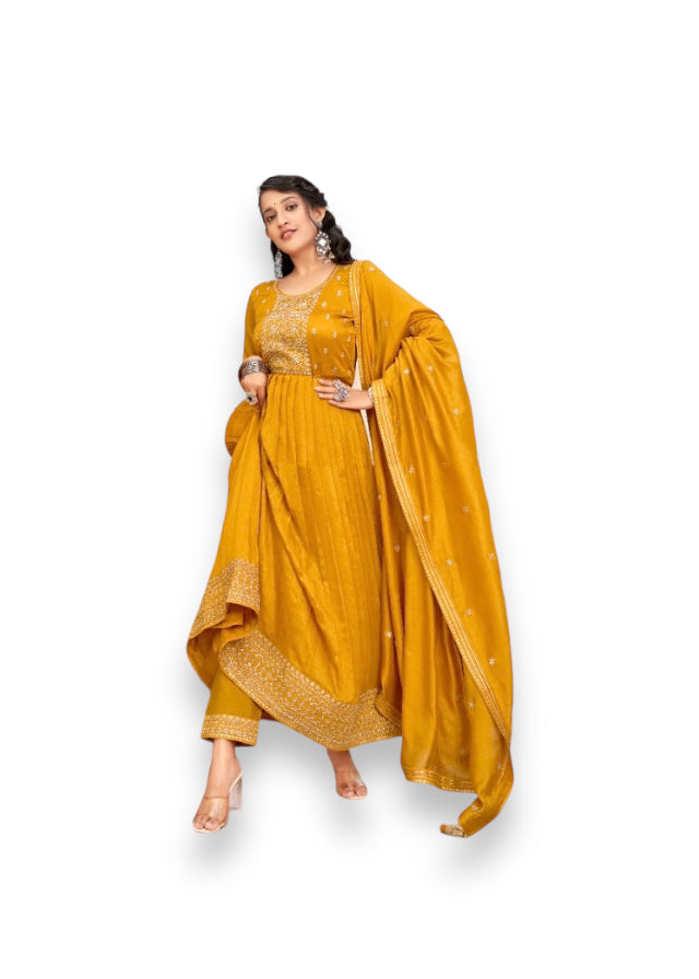 Traditional Vichitra Silk Salwar Suit with fancy work, ethnic wear for women, featuring intricate embroidery and vibrant fabric.