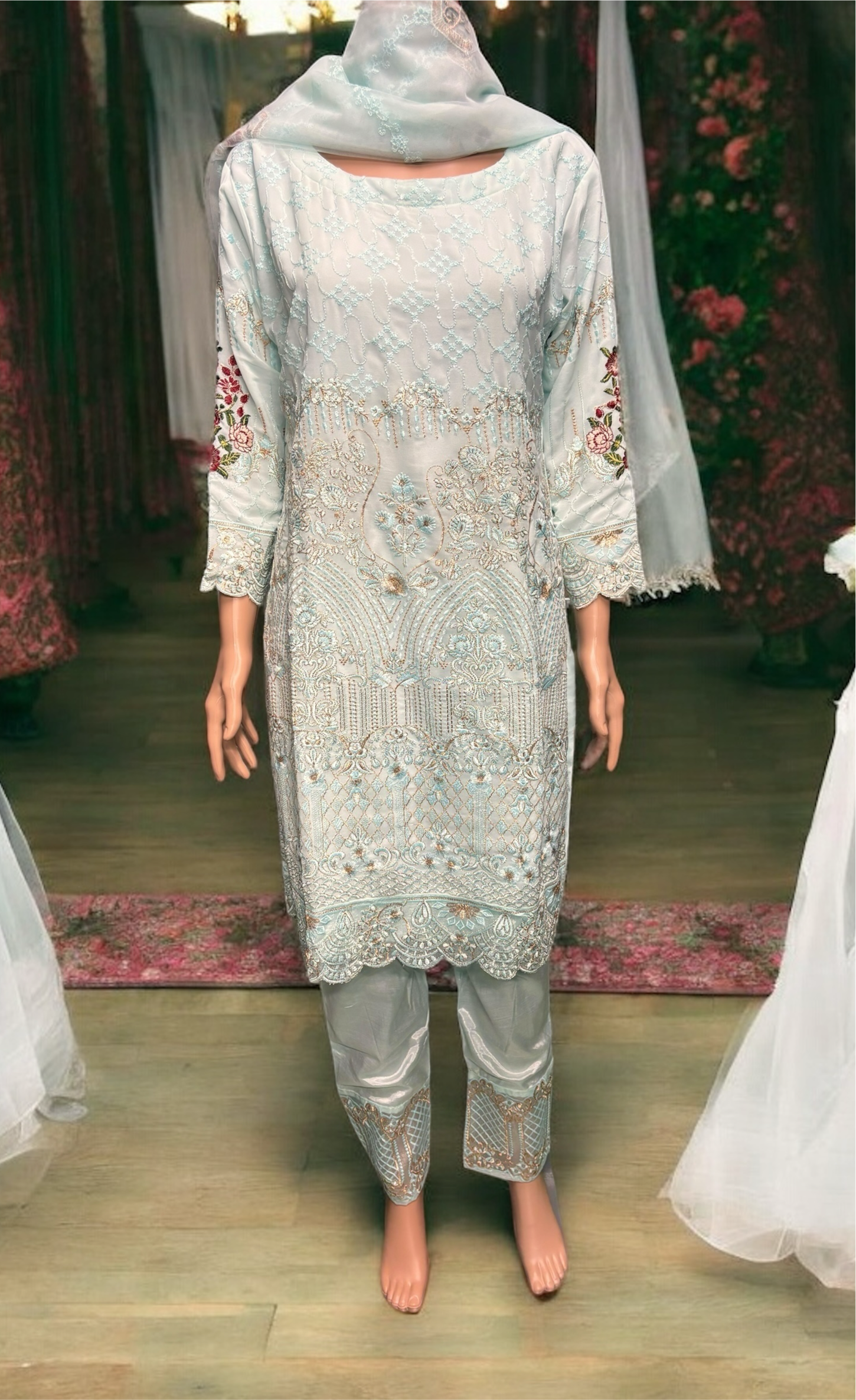 Sky blue georgette salwar kameez with intricate embroidery work, traditional ethnic wear for women by Saree Ghor Charlotte.