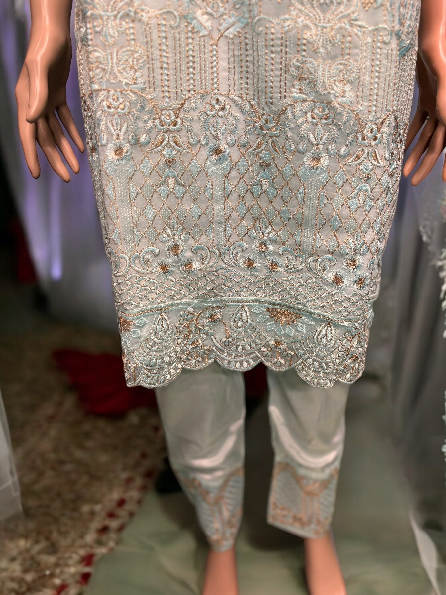 Sky blue georgette salwar kameez with intricate embroidery work, traditional ethnic wear for women by Saree Ghor Charlotte.