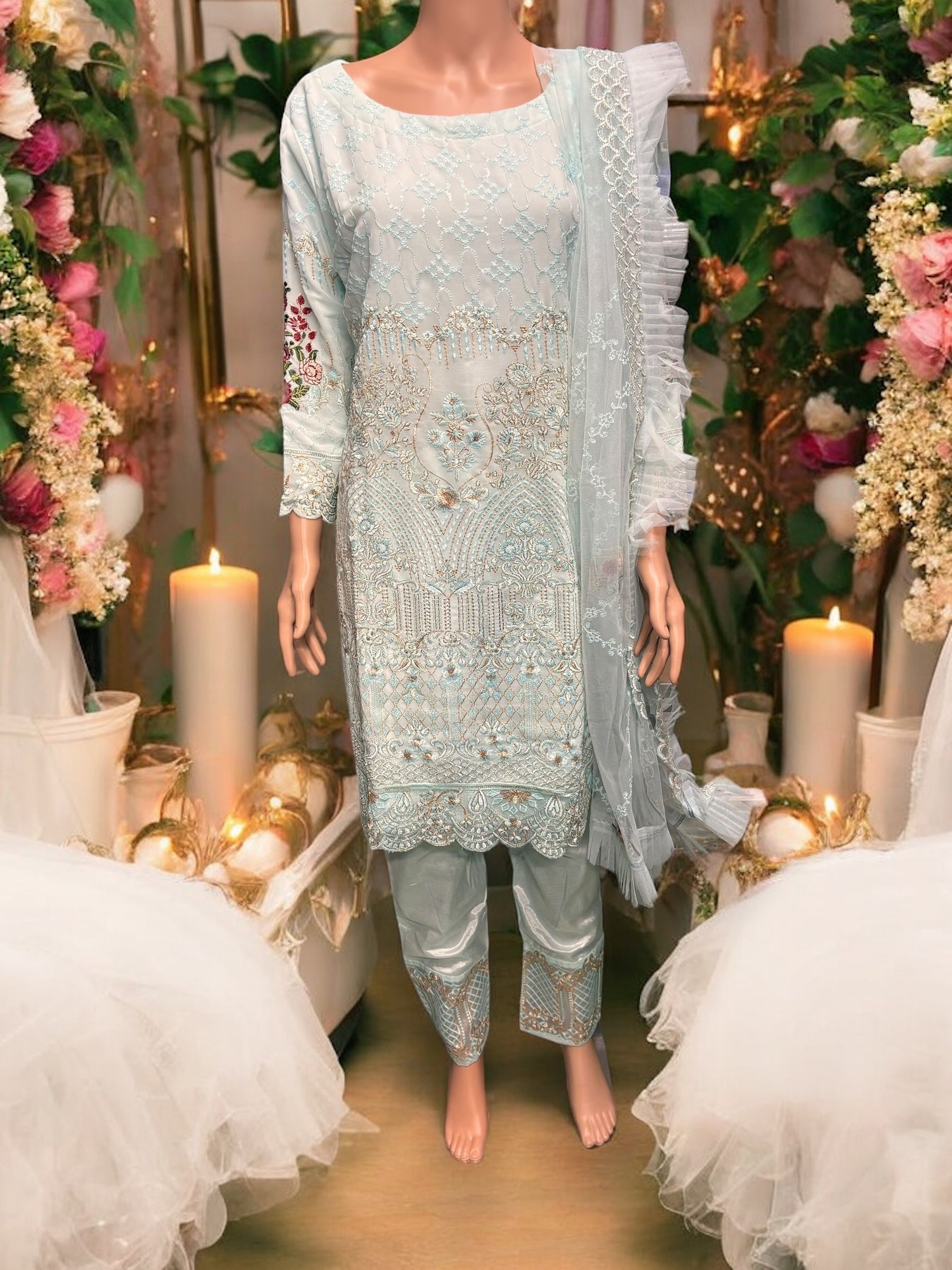 Sky blue georgette salwar kameez with intricate embroidery, traditional ethnic wear for women by Saree Ghor Charlotte.