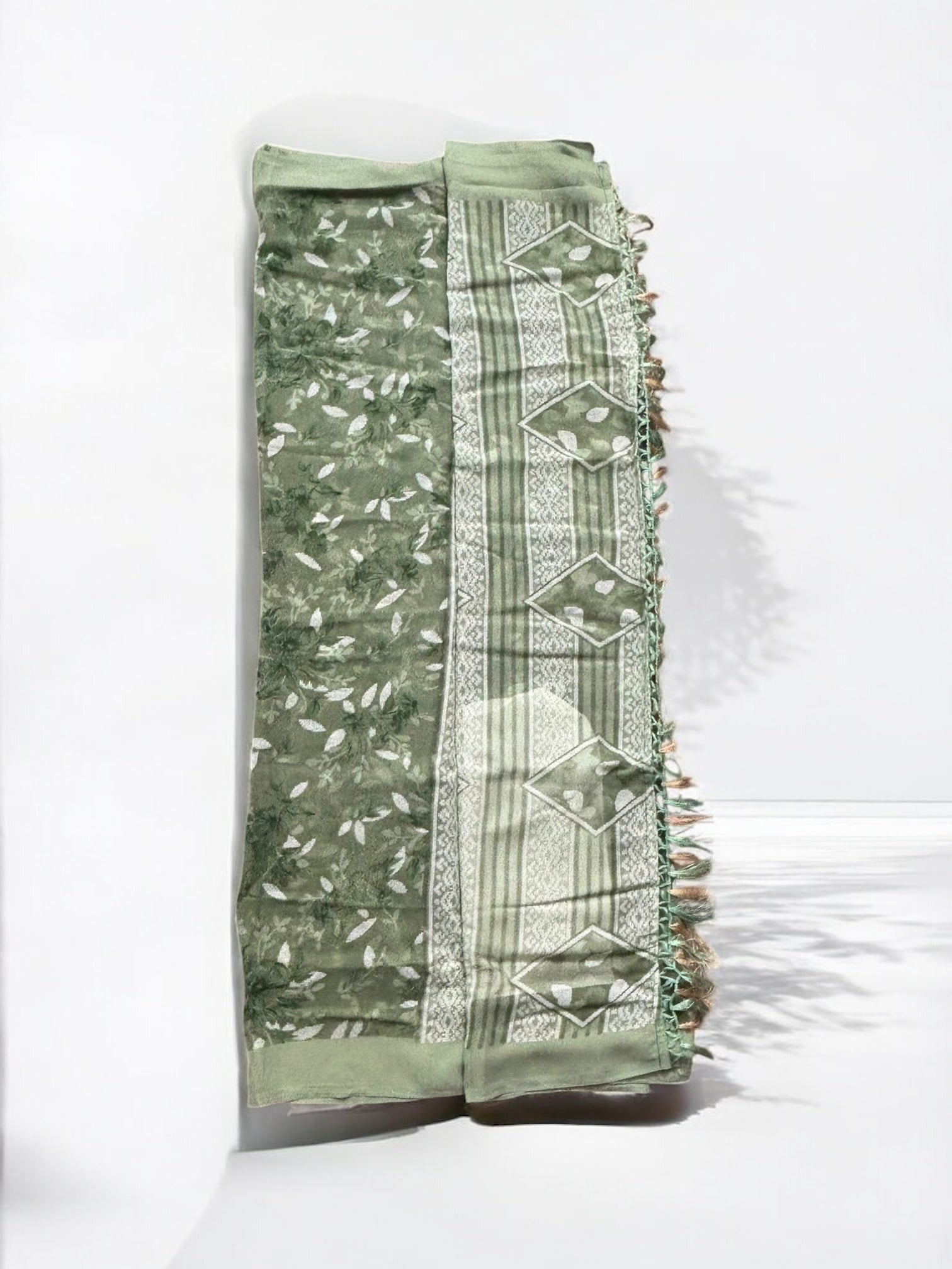 Traditional Saree by Saree Ghor Charlotte featuring intricate ethnic patterns, ideal for cultural wear for women.