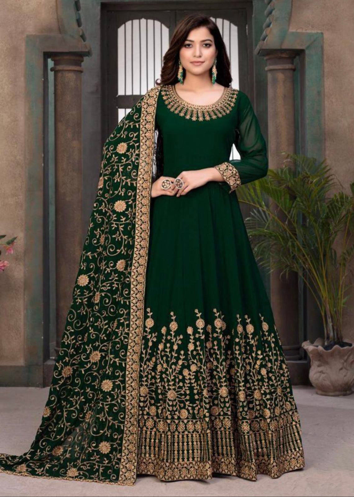 Glamorous Green Fox Georgette Gown with Opulent Heavy Embroidery Work