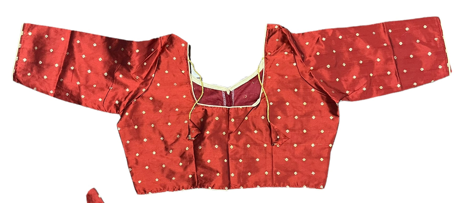 Red traditional ready-made blouse for saree by Saree Ghor Charlotte, showcasing intricate ethnic design for women's cultural wear.