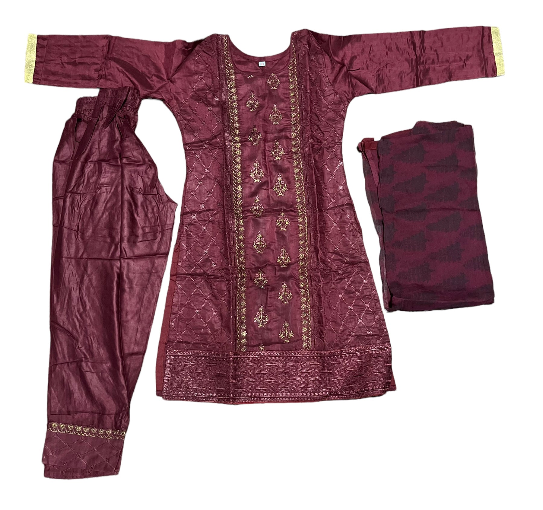 Traditional cotton salwar kameez set for girls, ethnic wear by Saree Ghor Charlotte, featuring colorful fabric and cultural design.