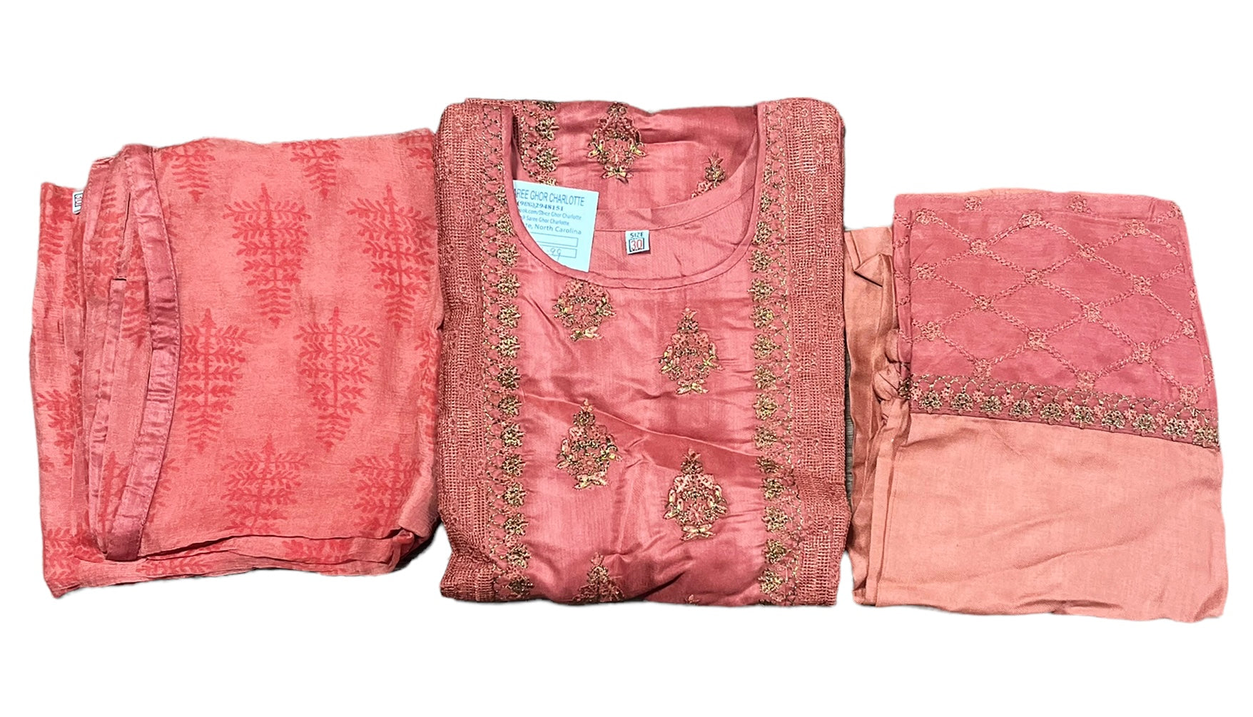 Traditional cotton salwar kameez set for girls, ethnic wear by Saree Ghor Charlotte, featuring colorful fabric and intricate design.