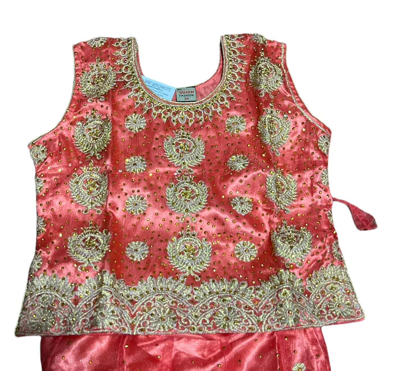 Traditional girls' Lehenga Choli set by Saree Ghor Charlotte, ethnic wear for kids aged 8-9, featuring colorful fabric and intricate embroidery.