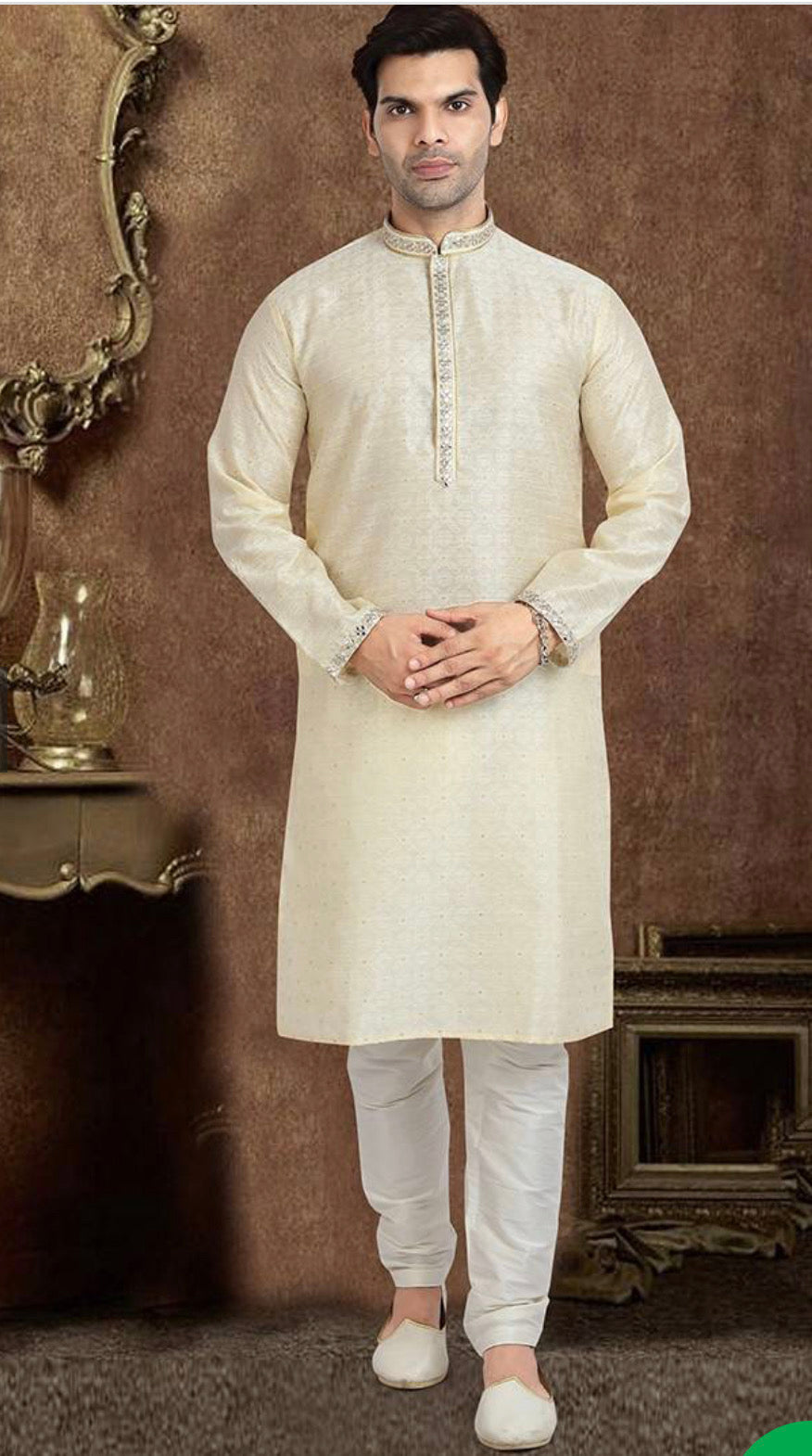Cream-colored traditional jacquard silk men's kurta with matching pajama, showcasing intricate ethnic design and craftsmanship.