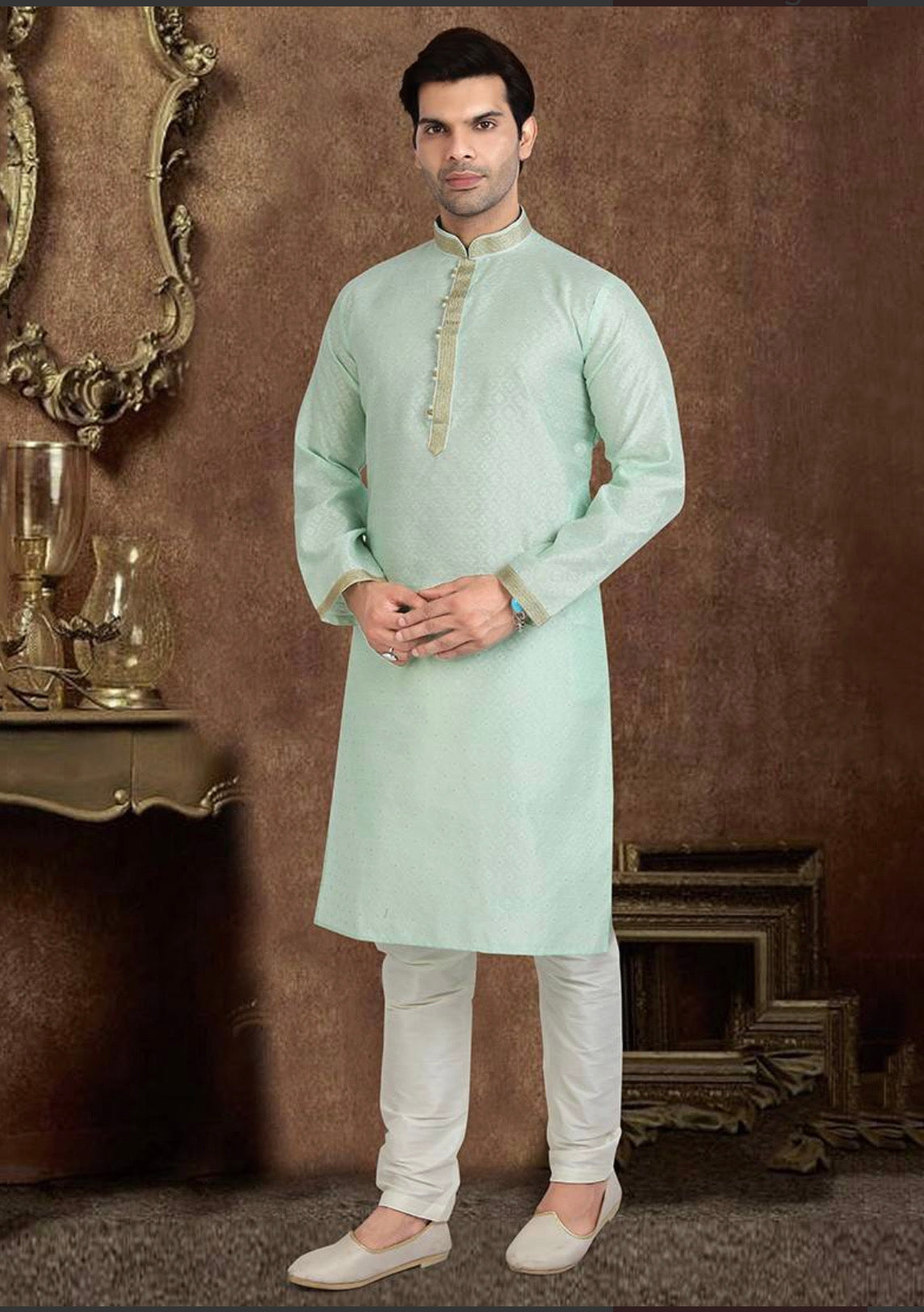 Elegant navy blue Jacquard silk men's kurta with intricate traditional patterns, paired with matching pajama for cultural wear.