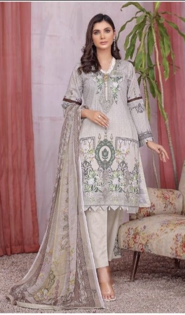 Traditional Soni Brand Pakistani Salwar Kameez for women, featuring intricate embroidery and vibrant ethnic attire.