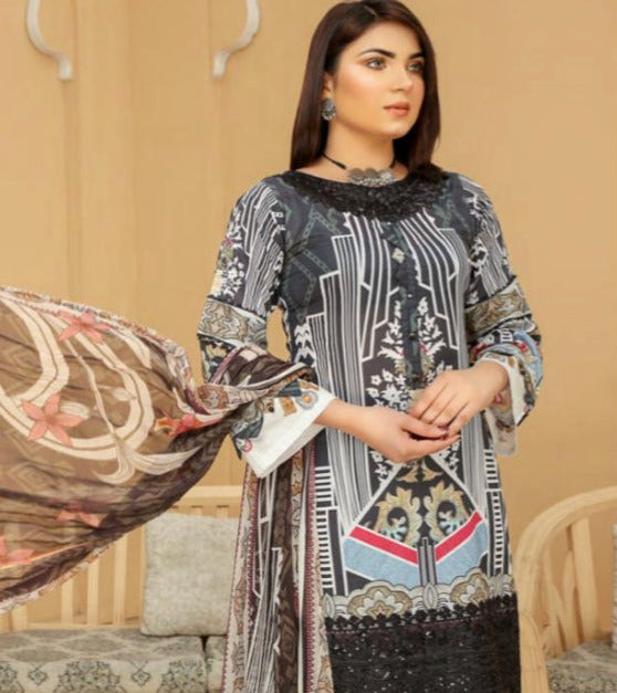 Traditional Soni Brand Pakistani Salwar Kameez for women, featuring elegant ethnic wear with intricate patterns and vibrant colors.