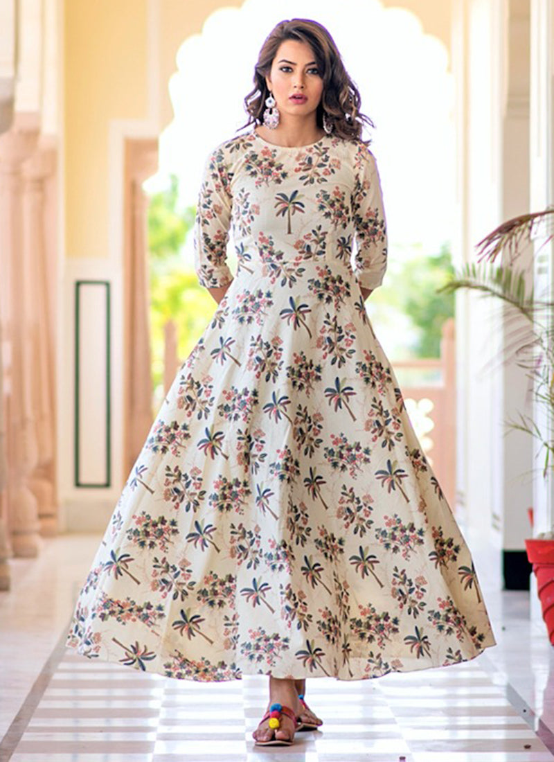 Cream muslin printed traditional salwar kameez gown by Saree Ghor Charlotte featuring ethnic work and elegant design for women.