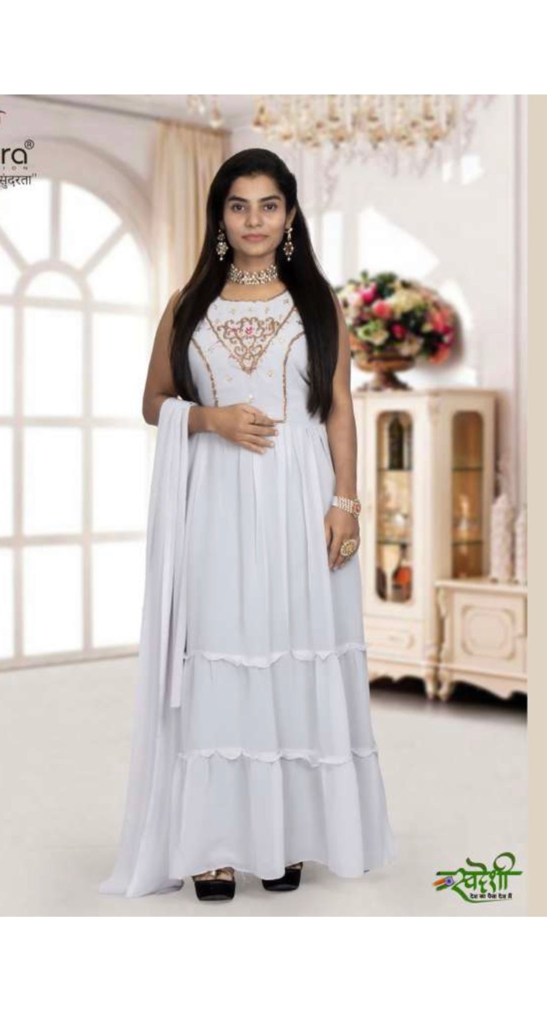 Elegant Georgette Stone Work Long Gown from Saree Ghor Charlotte, showcasing intricate embroidery and flowing fabric.