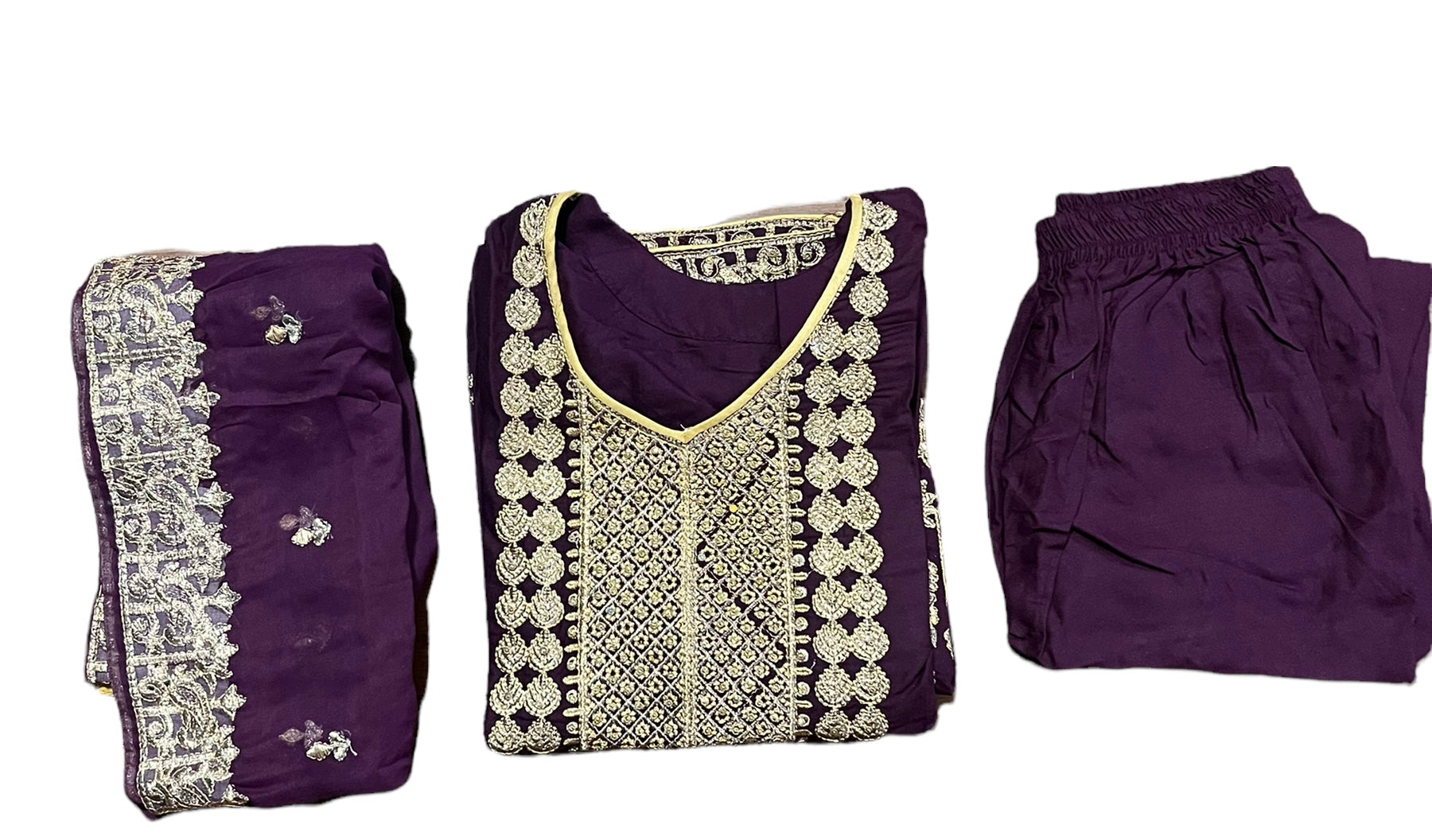 Traditional linen Salwar Kameez suit by Saree Ghor Charlotte, featuring intricate ethnic design and vibrant colors for women.