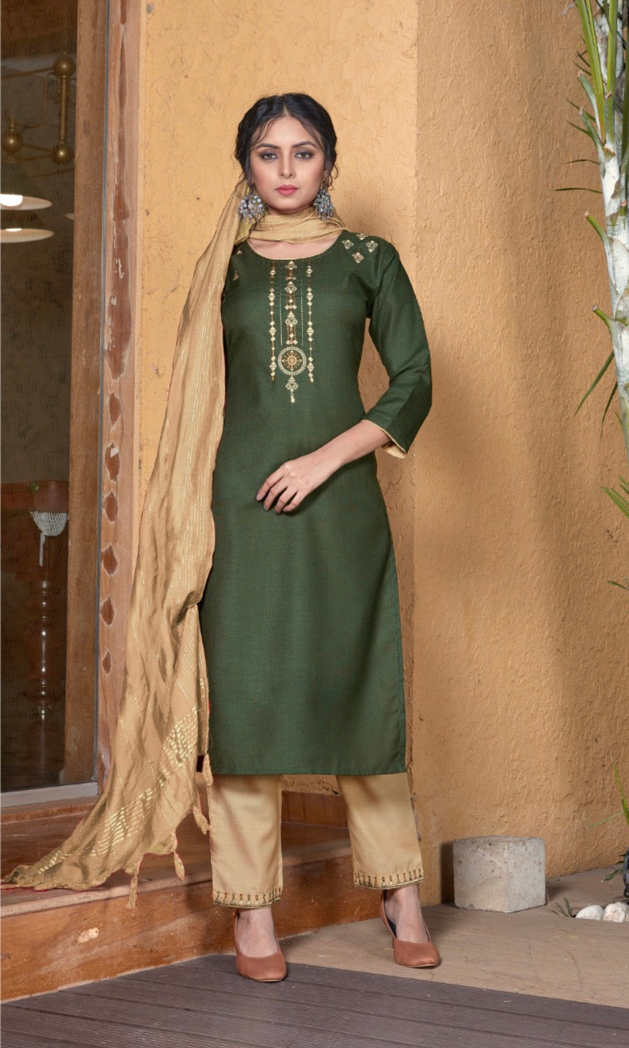 Traditional Saree Ghor Charlotte Salwar Kameez suit for women featuring intricate ethnic design and vibrant colors.