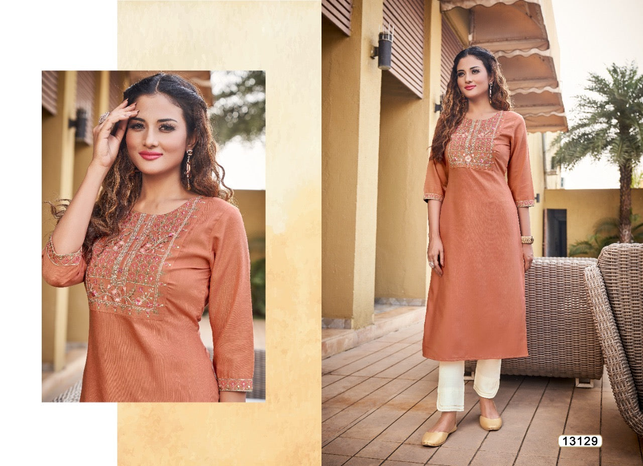 Kivi Liza designer rayon kurti with intricate embroidery, paired with matching salwar, from Saree Ghor Charlotte.