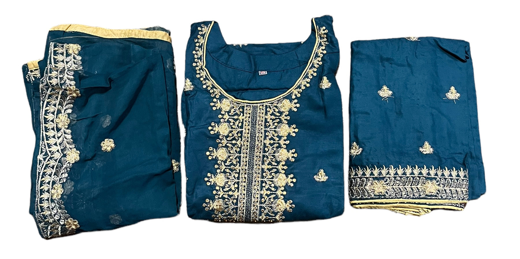 Stylish linen Aura party wear Salwar Kameez by Saree Ghor Charlotte with intricate embroidery and elegant design.