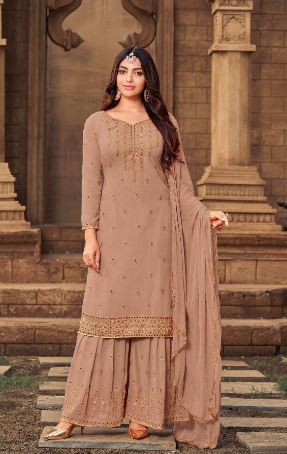 Traditional designer Salwar Kameez by Saree Ghor Charlotte featuring intricate embroidery and vibrant fabric, ethnic wear for women.