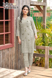 Traditional party wear Salwar Kameez set with kurti and pants by Saree Ghor Charlotte, featuring vibrant ethnic design for women.