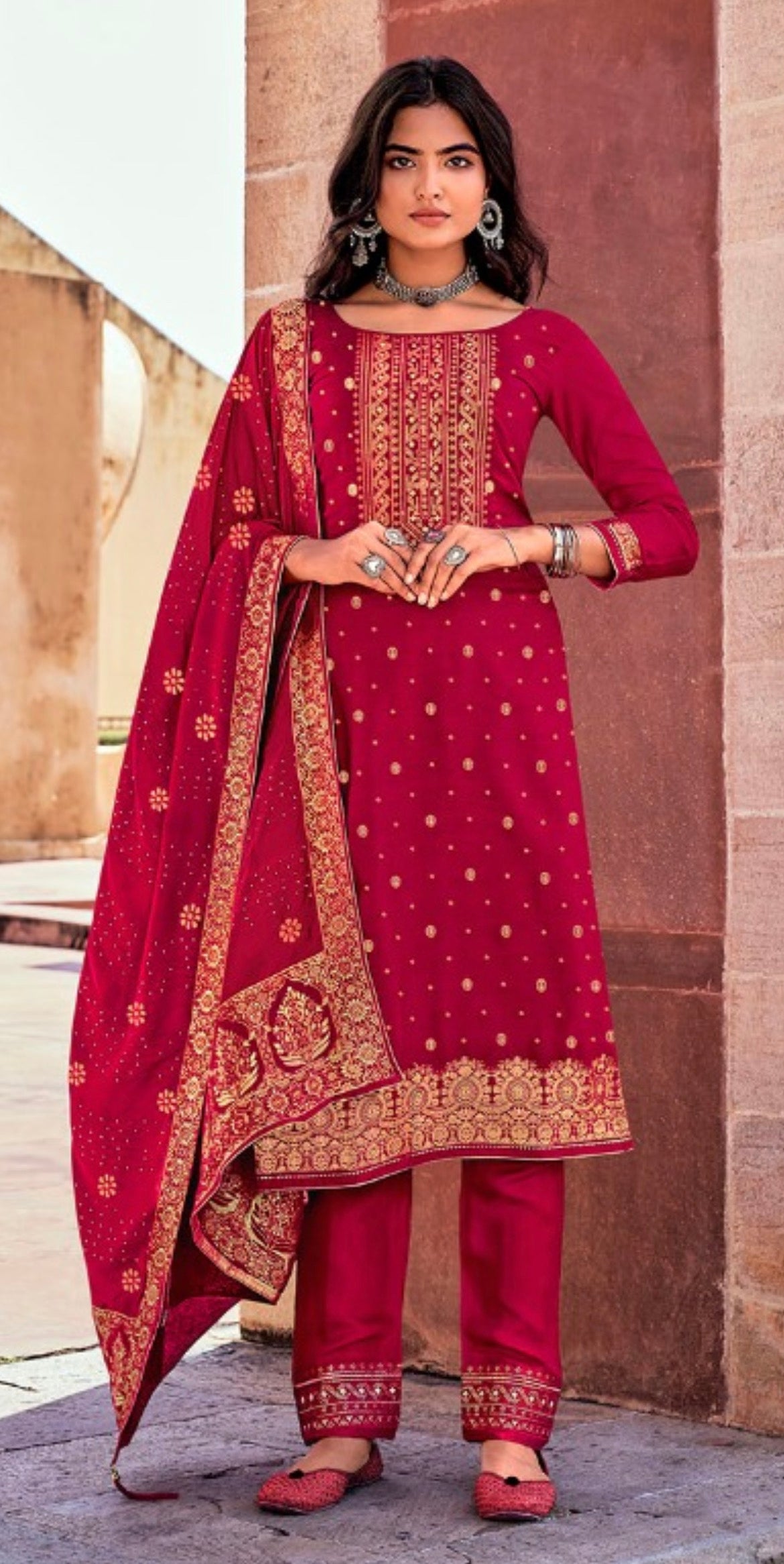 Traditional designer silk salwar kameez for women by Saree Ghor Charlotte, showcasing intricate embroidery and vibrant ethnic wear.